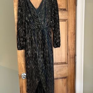 Size 4 black and gold dress. Never worn and tags are still on dress